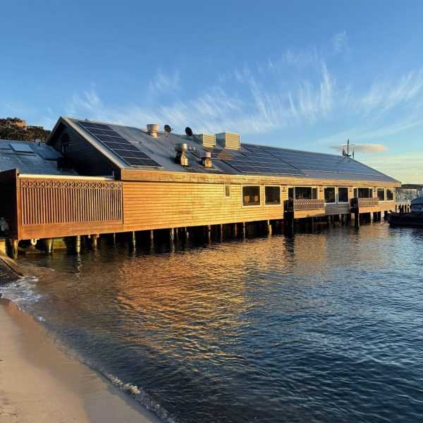 Damaged roof with solar panels being repaired in Sydney